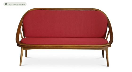 Scandinavian 2-seater sofa cherry wood stain and red fabric.
