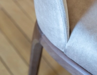 Designer chair dark brown stained wood and light taupe velvet fabric Designer chair dark brown stained wood and light taupe velvet fabric