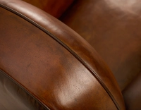Leather club armchair vintage brown studded armrests Leather club armchair vintage brown studded armrests