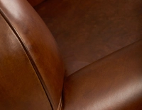 Leather club armchair vintage brown piped armrests Leather club armchair vintage brown piped armrests