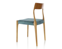 Chaise scandivave bois teinte merisier assise tissu velours bleu pétrole