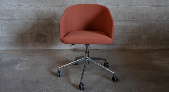 Oak chair design wood stained in xxxxx, seat upholstered in xxxxxx.