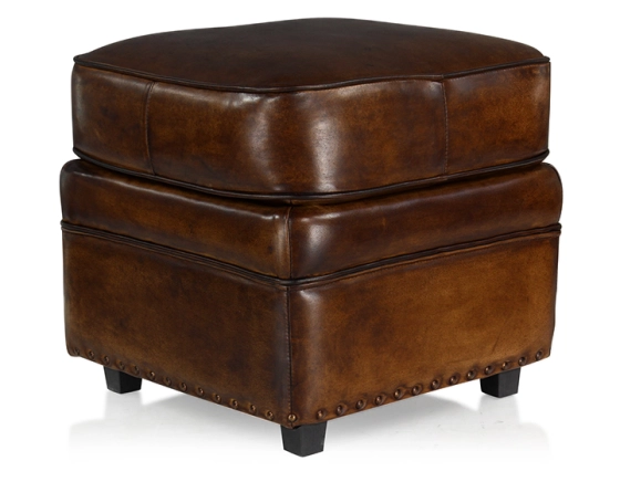Pouf cuir marron soutenu bord clouté