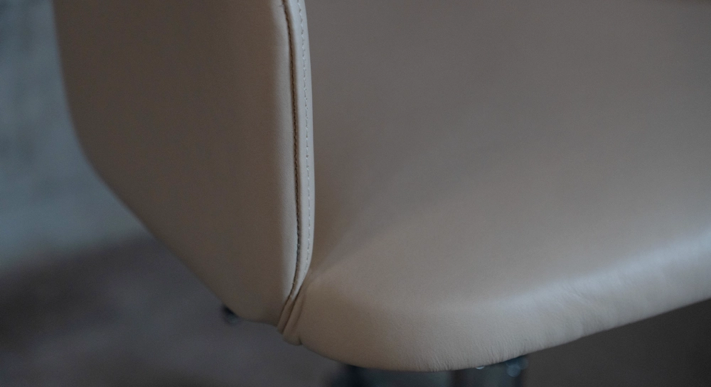 Oak chair design wood stained in xxxxx, seat upholstered in xxxxxx.