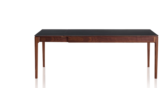 Table extensible 8 à 12 personnes en noyer et céramique allonges céramique avec bois teinte naturelle et plateau et allonges céramique noire unie 180x100 cm