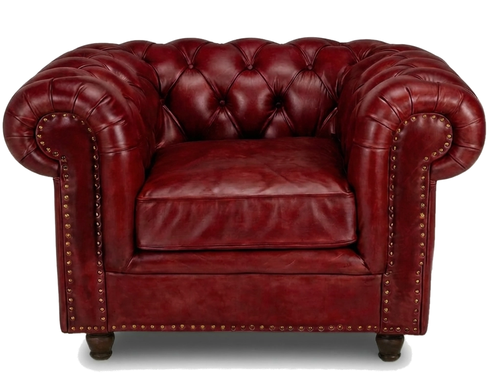 Sillón Chesterfield de piel rojo carmín reposabrazos con tachuelas
