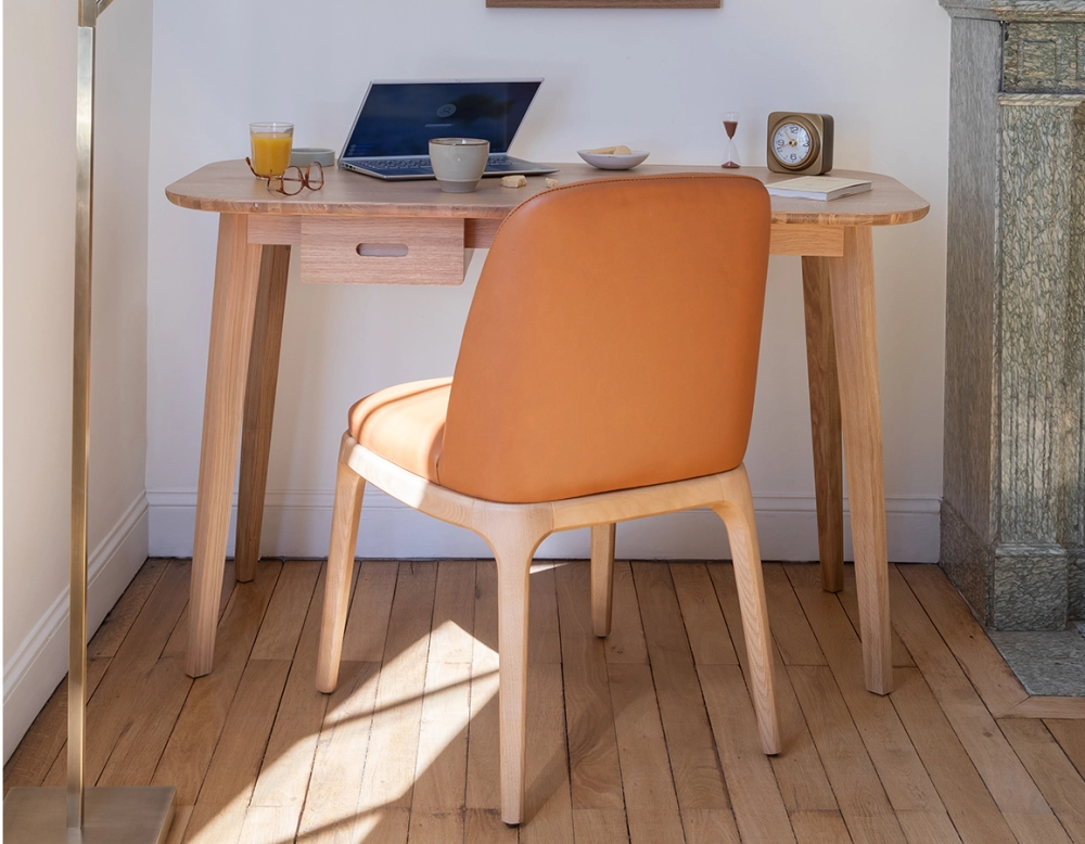 Designer chair natural stained wood and caramel leather Designer chair natural stained wood and caramel leather