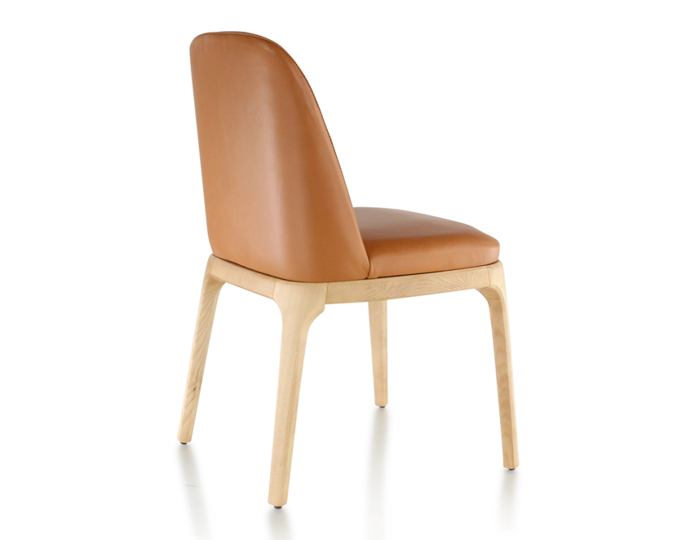 Designer chair natural stained wood and caramel leather Designer chair natural stained wood and caramel leather