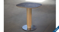 Bistro table in oak and ceramic for 2 people with a natural wood finish and a marbled grey ceramic top. Bistro table in oak and ceramic for 2 people with a natural wood finish and a marbled grey ceramic top.