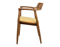 Chaise scandinave bois teinte merisier et tissu jaune Chaise scandinave bois teinte merisier et tissu jaune