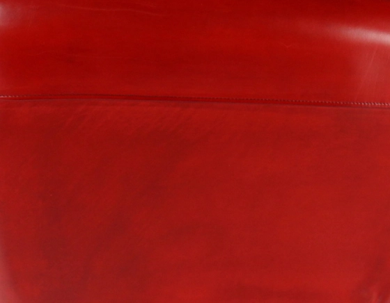 Chesterfield leather armchair red studded armrests