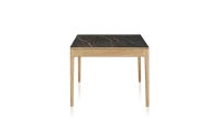 Table extensible en chêne et céramique allonges céramique avec bois teinte naturelle et plateau et allonges céramique effet marbre noir 140x90 cm