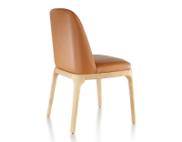 Designer chair natural stained wood and caramel leather Designer chair natural stained wood and caramel leather