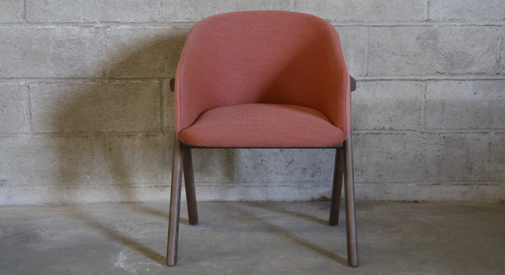 Oak chair design wood stained in xxxxx, seat upholstered in xxxxxx.