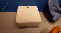Pouf en tissu chiné beige
