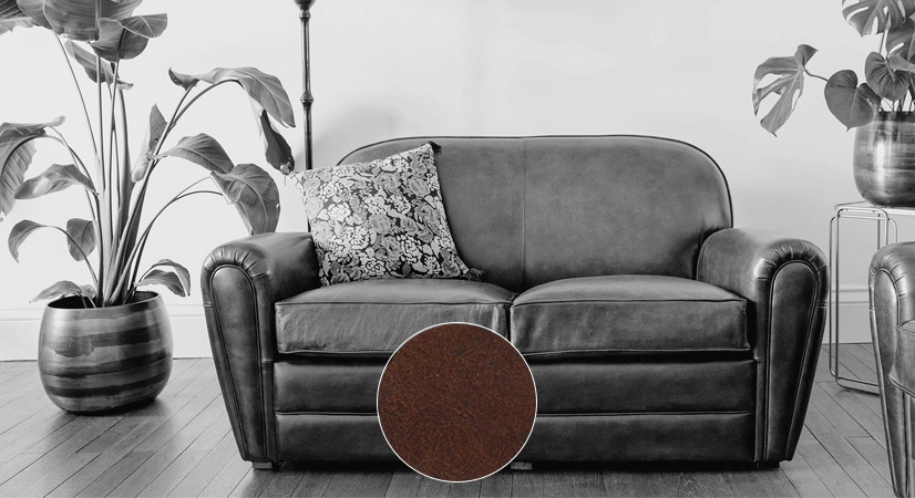 Canapé club cuir 2 places marron soutenu accoudoirs passepoil Canapé club cuir 2 places marron soutenu accoudoirs passepoil