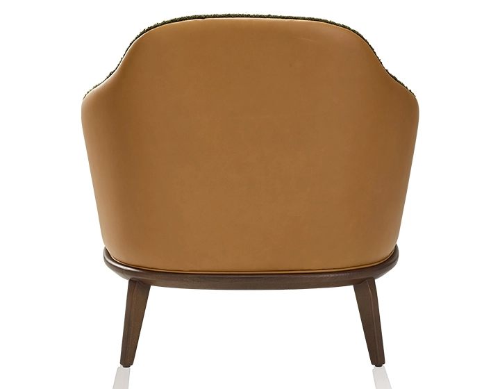 Fauteuil design cuir caramel et tissu bouclé vert Fauteuil design cuir caramel et tissu bouclé vert