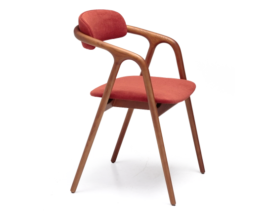 Scandinavian chair cherry wood stain, seat in beige burnt orange fabric.