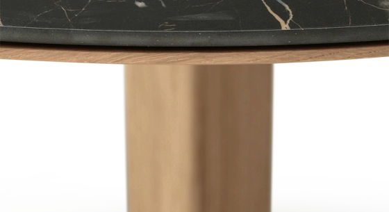 Round dining table in oak and ceramic for 6 people. with a natural wood finish and a black m2 marble-effect ceramic top. 120x120