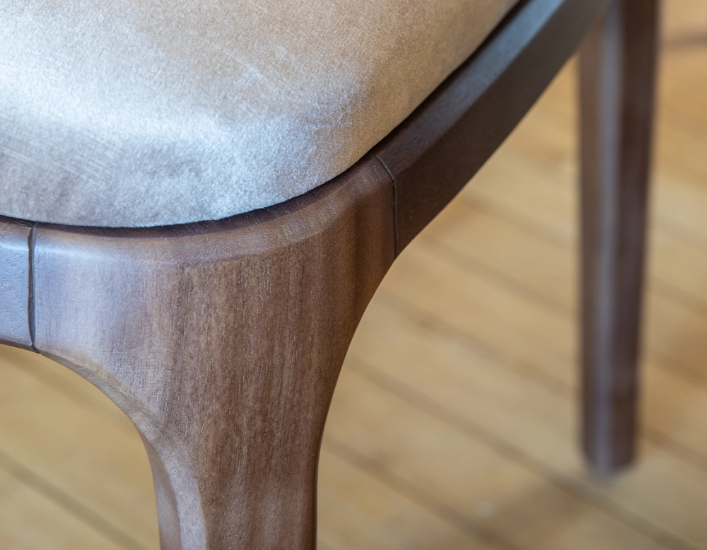 Designer chair dark brown stained wood and light taupe velvet fabric Designer chair dark brown stained wood and light taupe velvet fabric