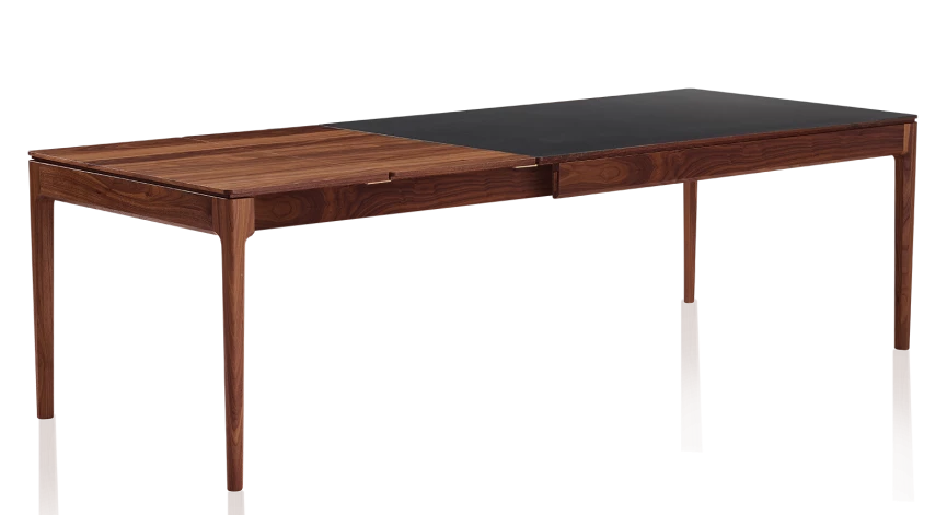 Table extensible en noyer et céramique allonges bois avec bois teinte naturelle et plateau céramique noir unie 140x100 cm