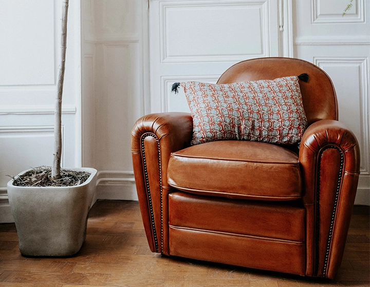 Leather club armchair light brown studded armrests Leather club armchair light brown studded armrests