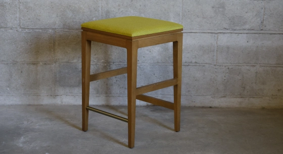 Design bar stool H65 cm natural wood finish with beige fabric seat