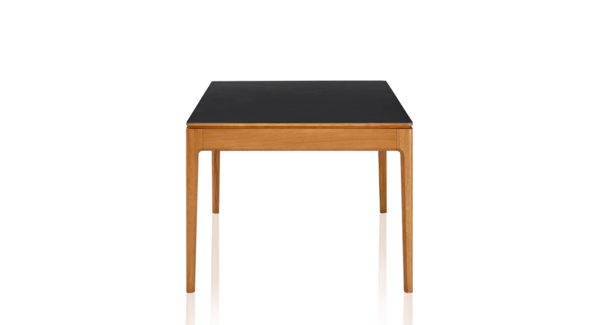 Table salle à manger en chêne et céramique avec bois teinte merisier et plateau céramique noir unie 140x90 cm