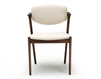Scandinavian chair dark brown stained wood with off-white fabric seat. Scandinavian chair dark brown stained wood with off-white fabric seat.