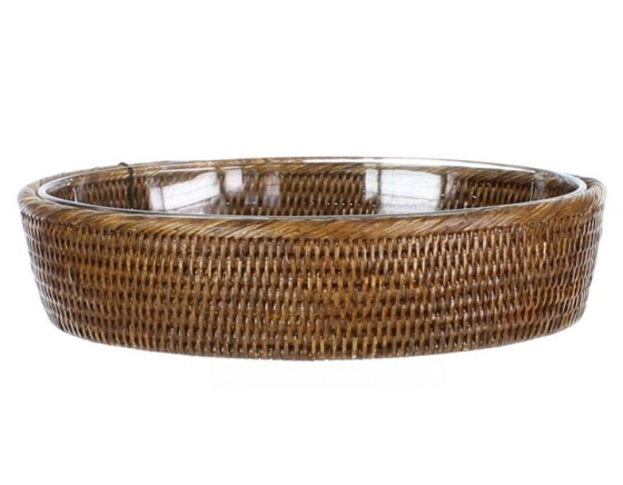 Very large oval pyrex dish with brown rattan stand