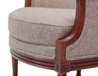 Fauteuil bergère mouluré style Louis XVI bois teinte ancienne et tissu orange Fauteuil bergère mouluré style Louis XVI bois teinte ancienne et tissu orange