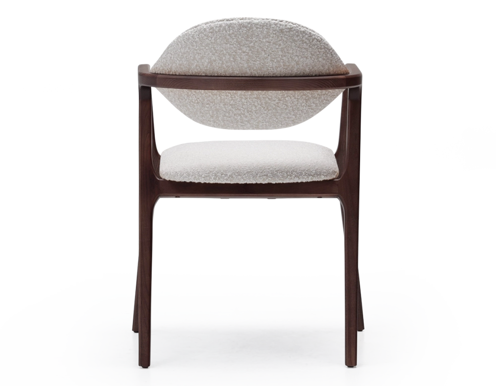 Designer armchair dark brown stained wood and white bouclé fabric. Designer armchair dark brown stained wood and white bouclé fabric.