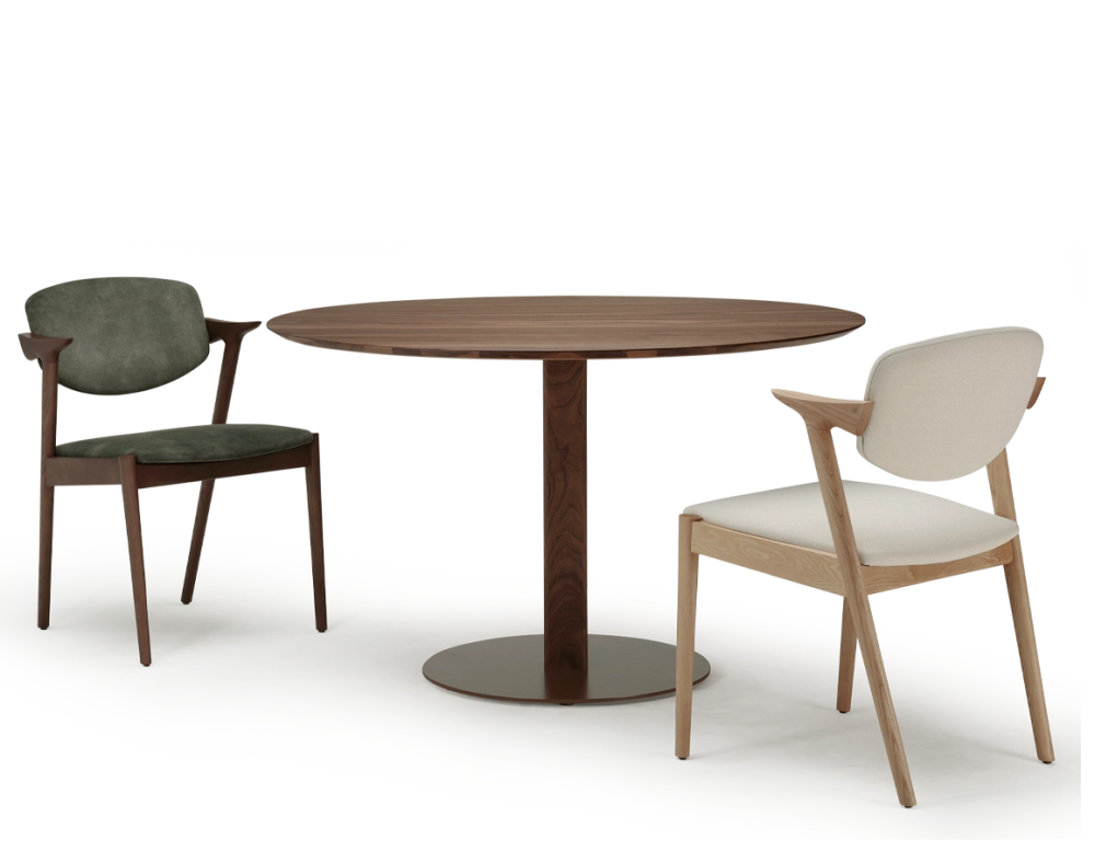 Scandinavian chair walnut-stained wood with forest green velvet seat. Scandinavian chair walnut-stained wood with forest green velvet seat.