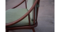 Fauteuil scandinave bois teinte noyer et tissu vert Fauteuil scandinave bois teinte noyer et tissu vert