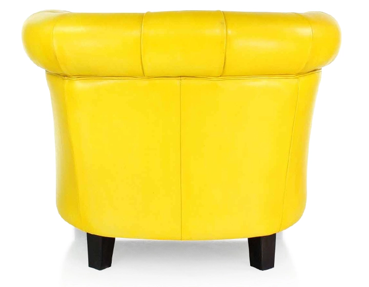 Chesterfield leather armchair yellow studded armrests Chesterfield leather armchair yellow studded armrests