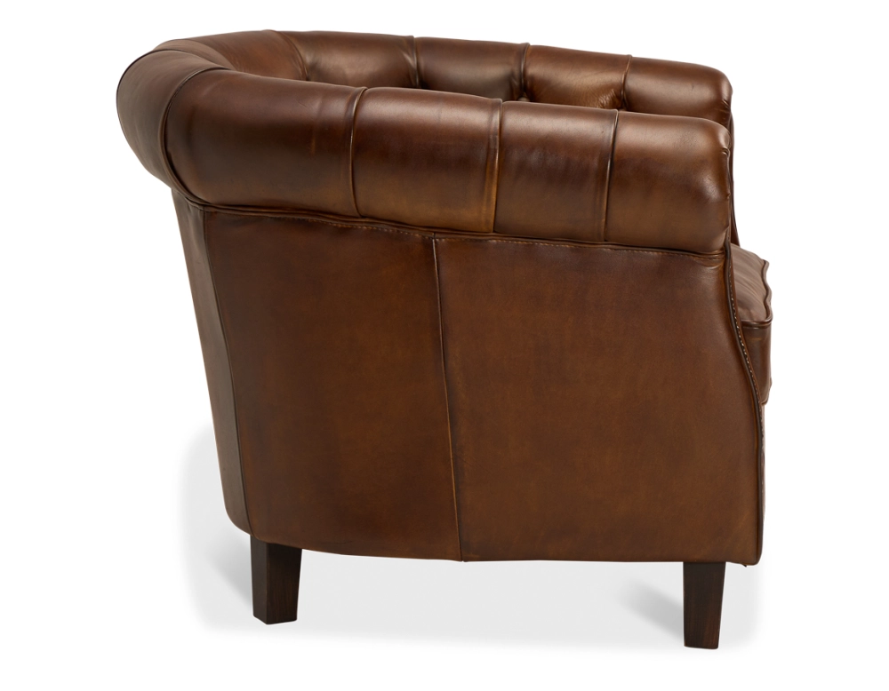 Fauteuil chesterfield cuir marron vintage accoudoirs cloutés Fauteuil chesterfield cuir marron vintage accoudoirs cloutés