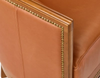 Fauteuil ancien accoudoirs moulurés bois teinte ancienne et cuir châtain